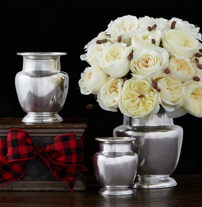 The MATCH - PETITE PEWTER RIMMED VASE by MATCH, filled with light pink peonies, displayed against a white background.