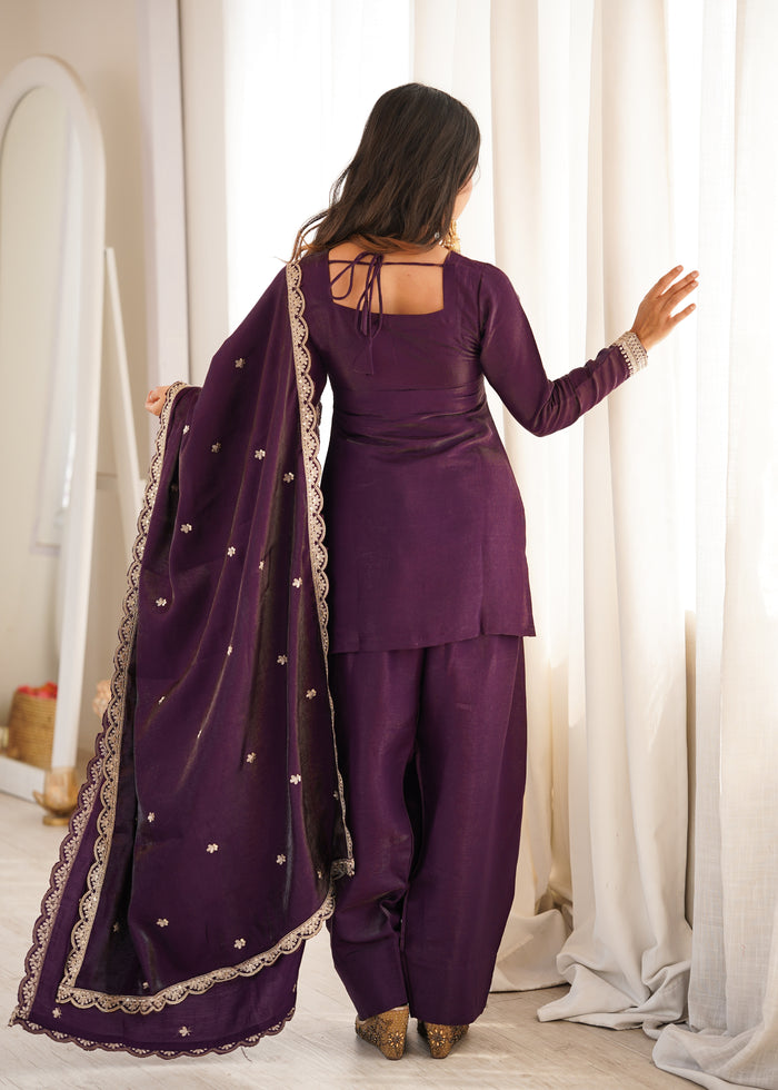 Stylish Woman in Chic Purple Ensemble