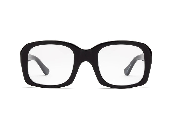 CADDIS - SHELBY PROGRESSIVE READERS by CADDIS are black, square, thick-rimmed eyeglasses with oversized frames and clear, scratch-resistant lenses. Shown front-facing on white; "Shelby" printed in white inside the left arm.