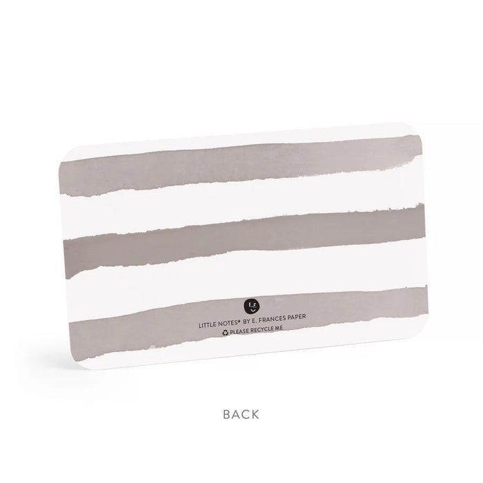 A clear box contains 85 tiny notecards each featuring a pink heart, labeled "E. FRANCES PAPER - BIG HEART LITTLE NOTES." With the tagline "use unsparingly," this minimalistic packaging enhances its unique charm.