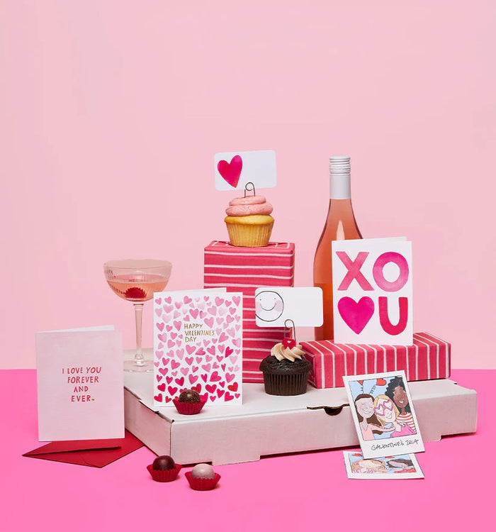 The E. FRANCES PAPER "If I Had More Hearts" Valentine Greeting Card features twelve pink watercolor hearts in a 3x4 grid on luxurious paper, with a message: "If I had more hearts, they would all be yours," and comes with a matching pink envelope.