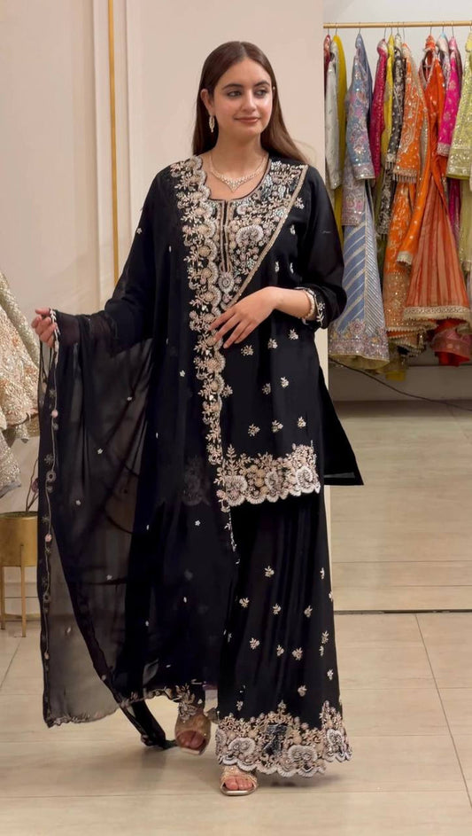 Elegance in Black and Gold Attire