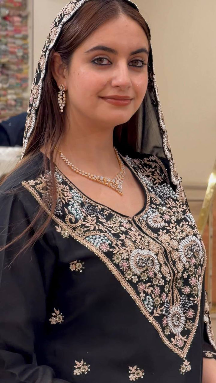 Elegance in Black and Gold Attire