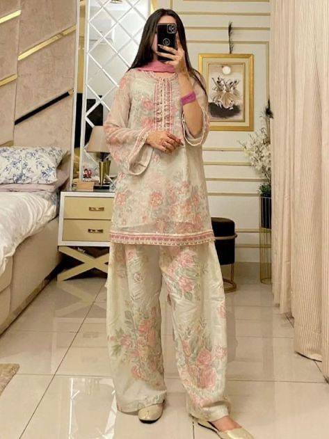 Elegant Essence The Allure of a Woman in a Graceful White Salwar Suit