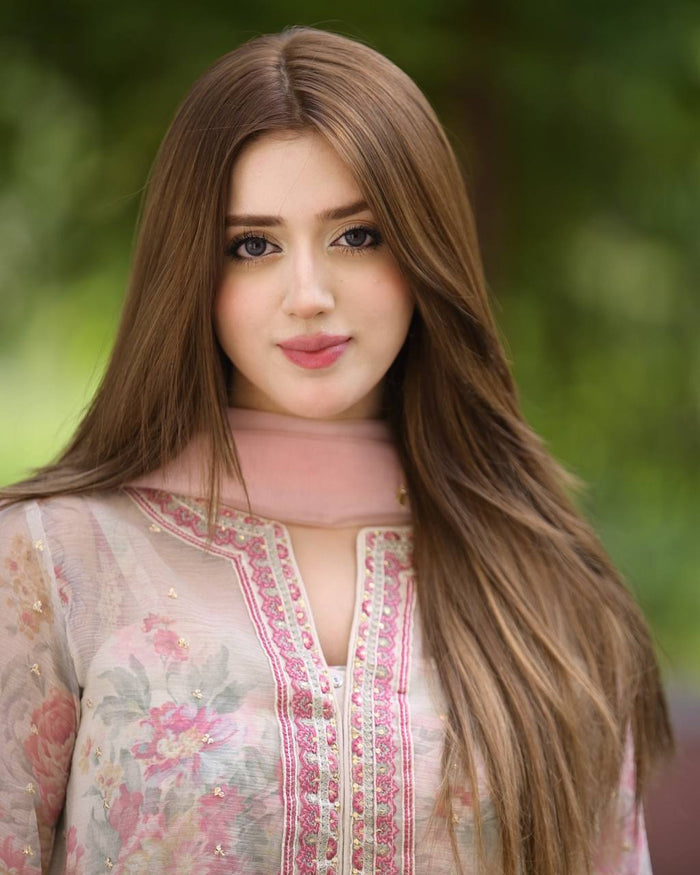 Elegant Essence The Allure of a Woman in a Graceful White Salwar Suit