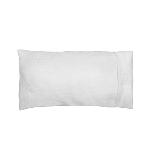 The IVORY EYE PILLOW - LINEN from E WIGHTMAN & CO is a rectangular white linen eye pillow with a visible seam near one end, possibly filled with flaxseed and lavender, shown against a plain white background.