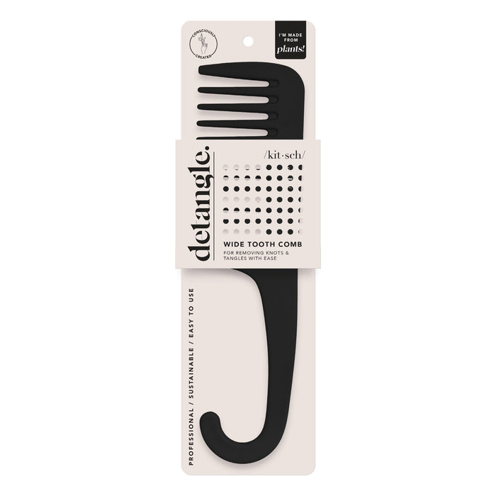The KITSCH - WIDE TOOTH COMB features a black wide-tooth design with a hook handle, no-slip texture, and packaging labeled "detangle" and "wide tooth comb." It's sustainably crafted from plants for removing knots and tangles. Brand: KITSCH.