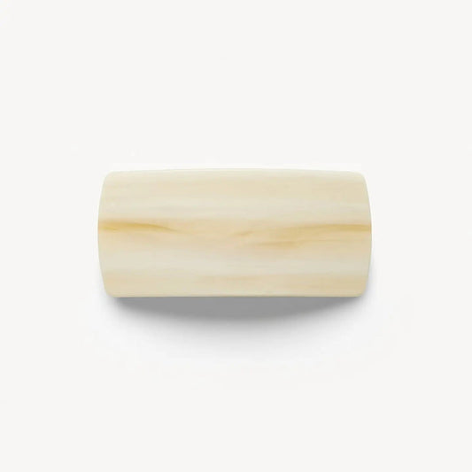 The MACHETE Jumbo Box Barrette in Alabaster, by MACHETE, is a rectangular ivory-hued hair accessory with smooth edges, shown on a plain white background.