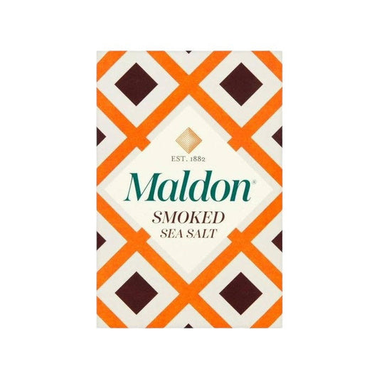 A box of MALDON - SMOKED SEA SALT from GOURMET FOOD SOLUTIONS is shown against a pink background. The box features a geometric design with orange, brown, and white patterns that illustrate the artisanal quality of English sea salt, with the text "MALDON - SMOKED SEA SALT" prominently displayed on the front.