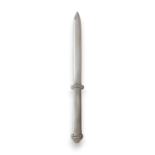 The MATCH - IONIC PEWTER LETTER OPENER by MATCH features a smooth, slightly rounded handle and a pointed end, shown vertically on a white background—a perfect office accessory.