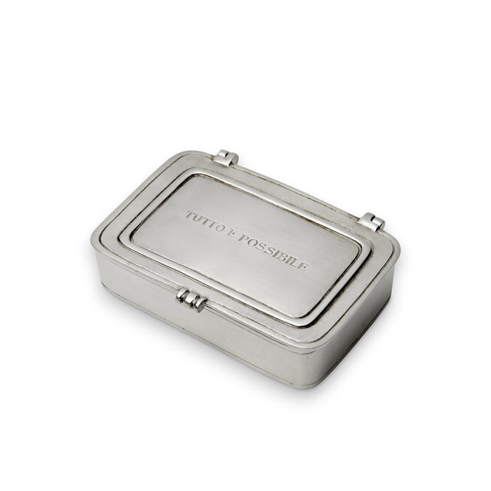 The MATCH - PEWTER 'TUTTO E POSSIBILE' BOX SMALL is a rectangular silver box with a hinged lid, engraved with "TUTTO È POSSIBILE," and features smooth edges and a timeless MATCH design.