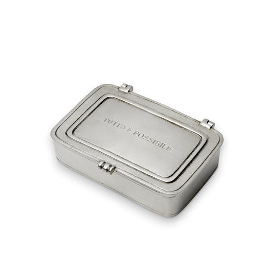 The MATCH - PEWTER 'TUTTO E POSSIBILE' BOX SMALL is a rectangular silver box with a hinged lid, engraved with "TUTTO È POSSIBILE," and features smooth edges and a timeless MATCH design.