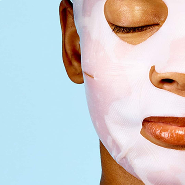 A black packet labeled "SKINCEUTICALS - BIOCELLULOSE RESTORATIVE MASKS (6PC)" by SKIN CEUTICALS, described as a replenishing mask for sensitive or post-procedure skin, with "Correct" at the bottom and a ruler along the left side.