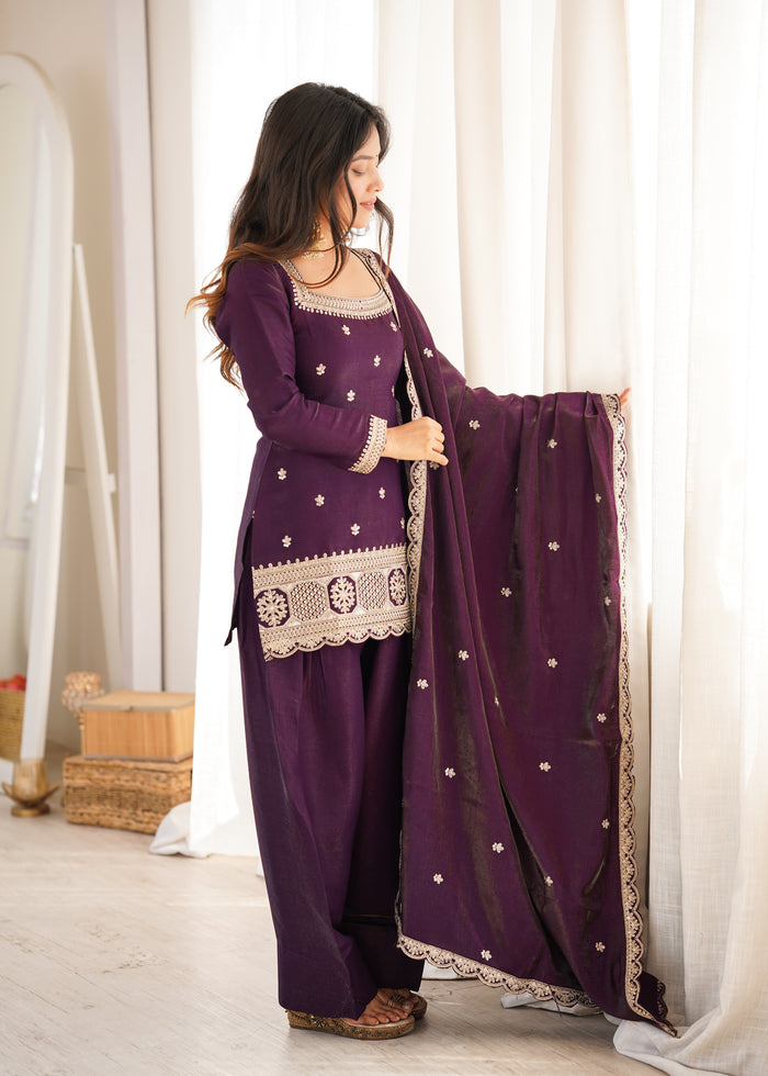 Stylish Woman in Chic Purple Ensemble