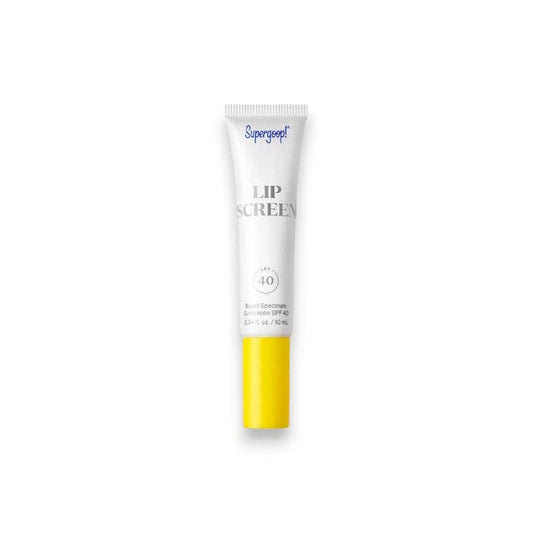 A tube of SUPERGOOP LIPSCREEN SHINE SPF40 with a white body, yellow cap, and blue text is shown against a plain white background. This non-sticky formula from SUPERGOOP keeps lips protected and comfortable all day.